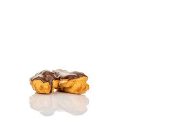 Chocolate sweet eclair, macro, isolated on white background.