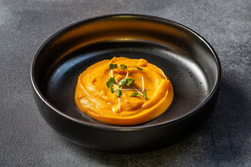 French style pumpkin puree with microgreens