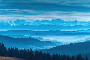 Serene blue-toned landscape misty forest valley ascending to snowy mountain peaks under cloudy skies, evoking calmness and vastness