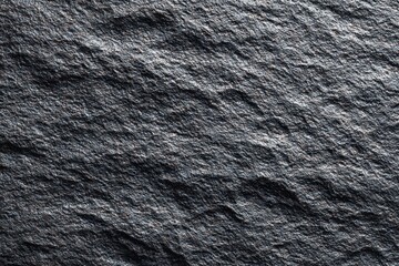 Black or dark gray rough grainy stone texture background. MZ 