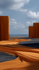 Abstract landscape with flowing orange fabric against a coastal backdrop


