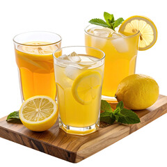 Fototapeta premium Three glasses of iced lemon drinks, garnished with lemon slices and mint leaves, on a wooden board