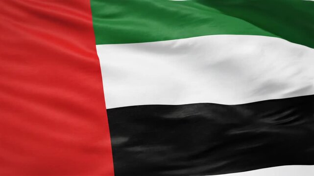 United Arab Emirates Flag Waves Proudly in the Breeze, Showing National Pride on a Sunny Day