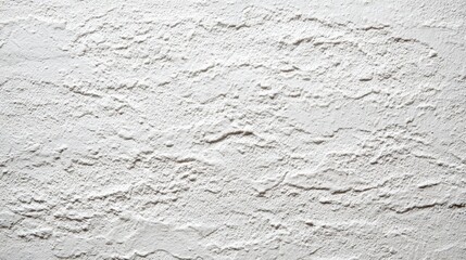 Obraz premium A rough-textured white wall showcases an organic design element, enhancing the ambiance of a contemporary space. The surface features subtle variations, adding depth and character.