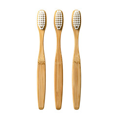 Three light brown bamboo toothbrushes with white bristles