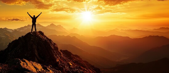 Motivational scene with person on mountain summit arms raised at sunrise symbolizing success freedom inspiration and personal growth. 
