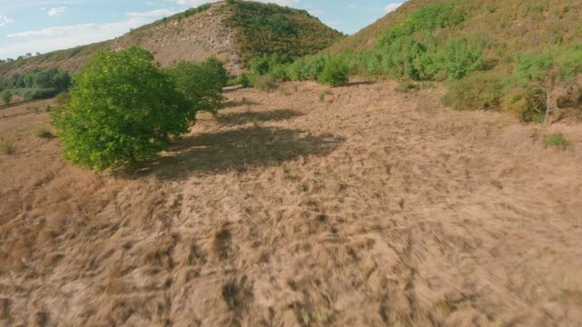 FPV drone aerial shot. Mountain views of nature landscape of the Moldavian National Park, Furceni Village, Moldova, Europe