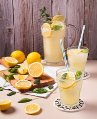 Refreshing lemonade with lemon slices and mint garnish