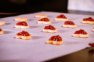 Heart shaped cookies with strawberry jam