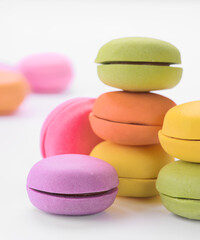 Colorful French macarons stacked in delicious display