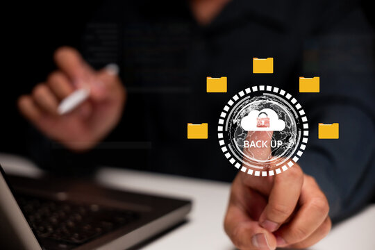 A person interacts with a digital interface displaying cloud backup options, emphasizing data protection and security.