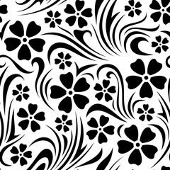 Seamless floral pattern with small flowers silhouettes on a white background. Vector black and white floral print