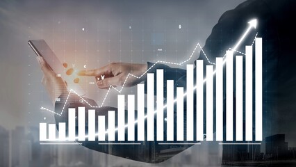 A person holding a smartphone reviews financial data on a digital screen, showcasing growth trends and analytics against an urban backdrop. Ideal for business themes. Copula