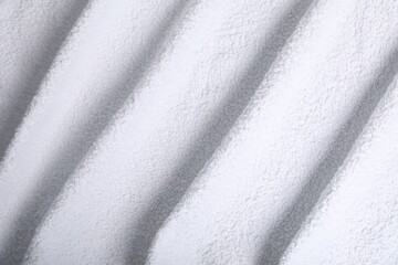 White terry towel as background, top view