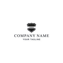 Minimalist black and white logo design featuring a shield emblem with text below.