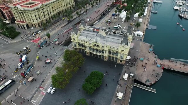 Urban Waterfront and Historic Architecture. Monumental Colom Square in Barcelona