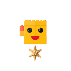 Obraz premium Smiling lego face and starfish isolated on transparent background