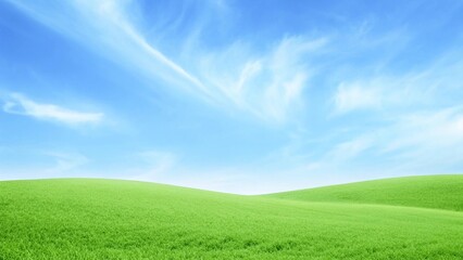 Obraz premium Panoramic Minimalist Landscape with Rolling Green Hills under Clear Blue Sky and Wispy White Clouds, Serene Outdoor Nature Scene in Bright Soft Daylight 
