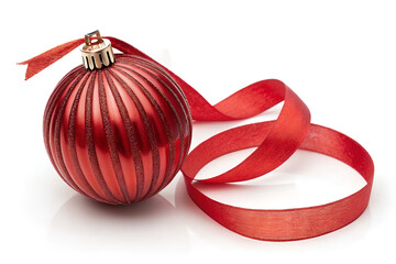 Festive Red Ornament: A solitary red ornament, a symbol of yuletide cheer, is elegantly displayed, complemented by a gracefully curving ribbon, evoking feelings of joy and tradition.
