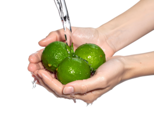 Fresh limes under running water in hand natural light photograph PNG