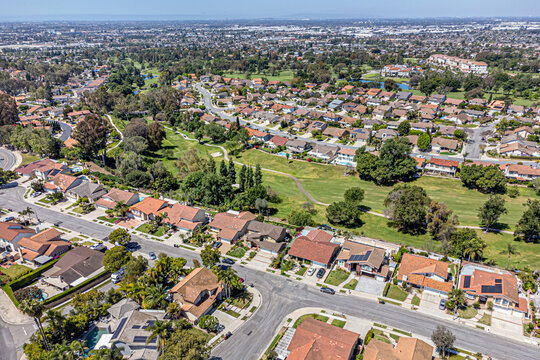 Fullerton, Orange County, CA, California, May 7, 2024: Aerial Drone City View Los Coyotes Country Club, Golf Property, Golf-Front Homes, Townhouse, Houses, Streets
