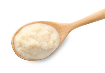 Tasty horseradish sauce in spoon isolated on white, top view