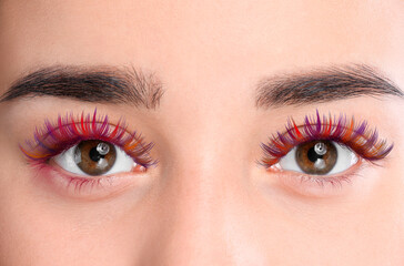 Young woman with beautiful colorful eyelashes, closeup