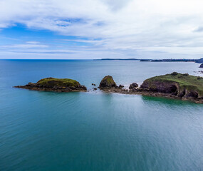 Obraz premium An aerial view of the headland at Monkstone Point, Pembrokeshire, Wales in springtime