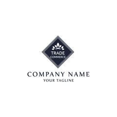 Dark navy blue logo design for a trade commerce company, featuring a diamond shape and stylized floral elements.