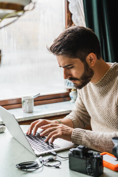 Man Working on Laptop AT HOME