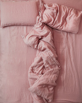 Double bed that has been slept in by only one person
