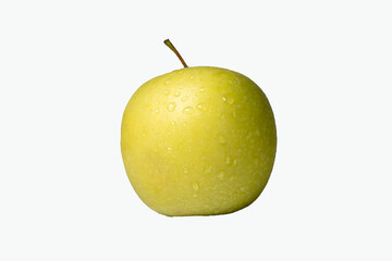 Fresh yellow apple with water droplets on white background