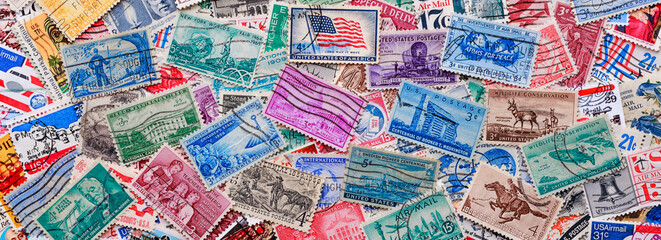 Philately.Postage stamps UNITED STATES OF AMERICA .Collection of stamps and magnifying glass.A...