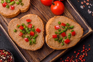 Vegan sandwiches with bread, mushroom or bean pate and vegetables. Vegetarian pate sandwiches