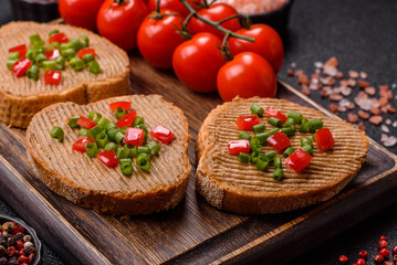 Vegan sandwiches with bread, mushroom or bean pate and vegetables. Vegetarian pate sandwiches
