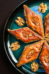 Baklava with walnuts. Homemade baklava with nuts and honey.