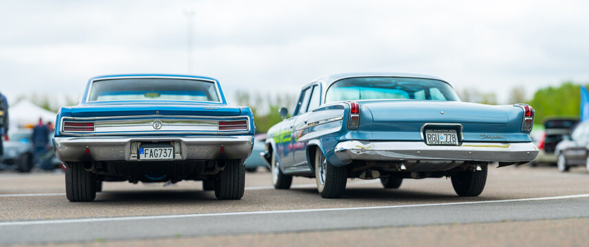 Gothenburg, Sweden - May 11 2025: Two classic American cars parked side by side.