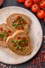 Vegan sandwiches with bread, mushroom or bean pate and vegetables. Vegetarian pate sandwiches