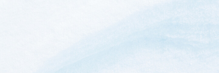 Wide panoramic winter background with snowy ground. Natural snow texture. Wind sculpted patterns on snow surface. Closeup top view with copy space.