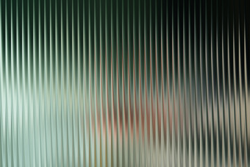 An abstract background featuring a pattern of vertical lines with blurred and textured appearance.