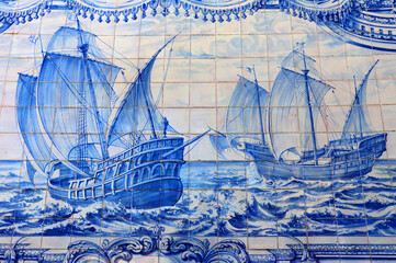 Portugal, Lisbon. Important historical - ca 1775, blue and white Azulejo ceramic tiled mural, depicting two Caravels - caravelas sailing on the Portuguese voyages of discovery in the early 1500's. © john copland