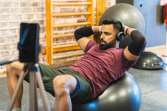 Abdominal Workout on an Exercise Ball with a Smartphone