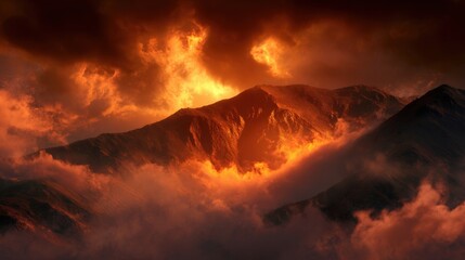 Fototapeta premium Fiery Sunset Over Rugged Mountain Peaks with Dramatic Clouds