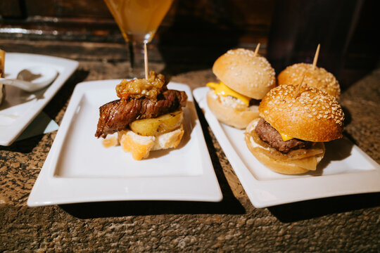 Gourmet Appetizers on White Plates