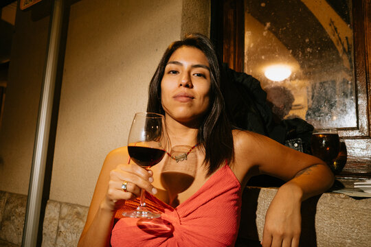 Portrait of Woman Holding Wine Glass