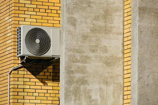 Air conditioning on the outside wall of the house 