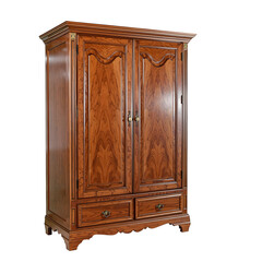 Elegant antique wooden wardrobe with ornate detailing and two drawers, a timeless piece of furniture for any home