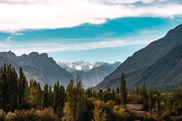 Fototapeta premium Majestic snow-capped Himalayan mountains near Leh under clear blue sky, showcasing stunning natural landscape, winter wilderness, breathtaking panoramic view of rugged peaks scenic tranquility