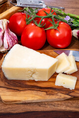 Pieces of matured pecorino romano italian cheese made from sheep milk in Lazio, Sardinia or Tuscany