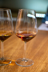 Visit of wine cellar with old large oak barrels, tasting of fortified dry or sweet tasty marsala wine in Marsala, Sicily, Italy
